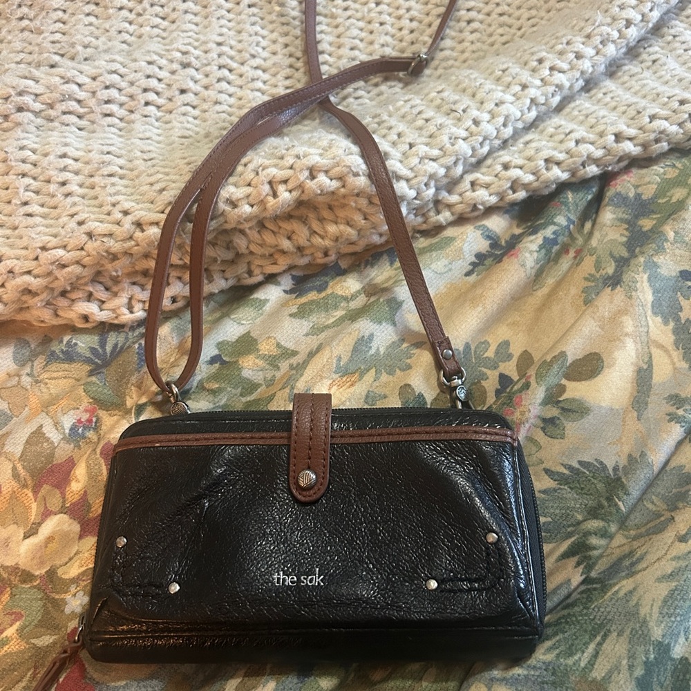 The Sak Black and Brown women’s wallet crossbody with phone case